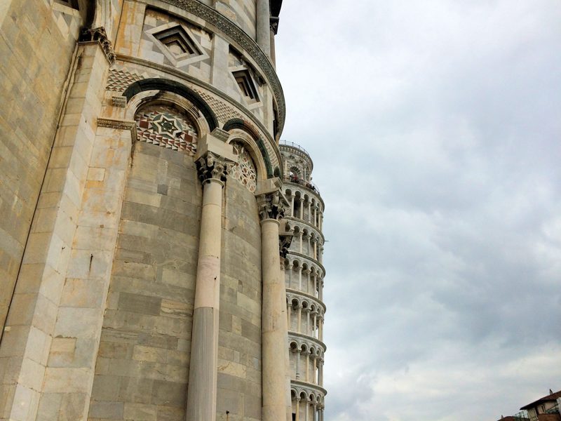 The Leaning Tower peeking out from behind the much more effectively constructed Duomo.