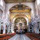 Students stand admiring the mosaic program in the apse of the Basilica of Santa Prassede.