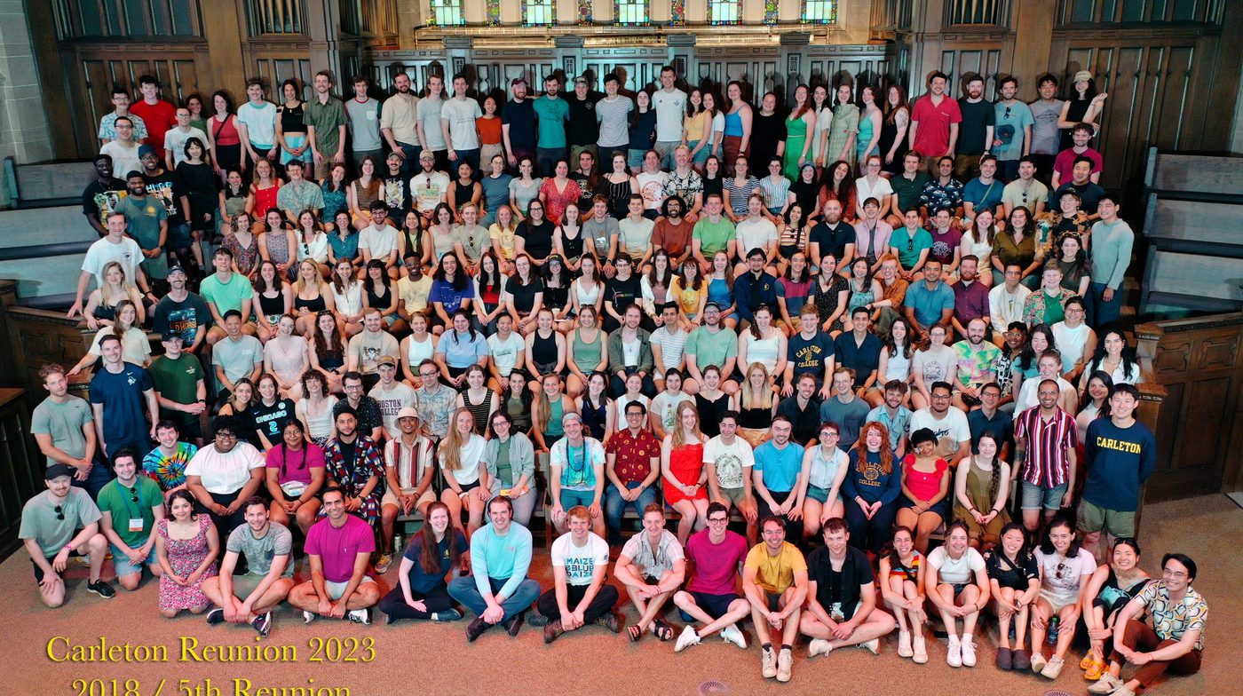 college classmates in group photo at reunion