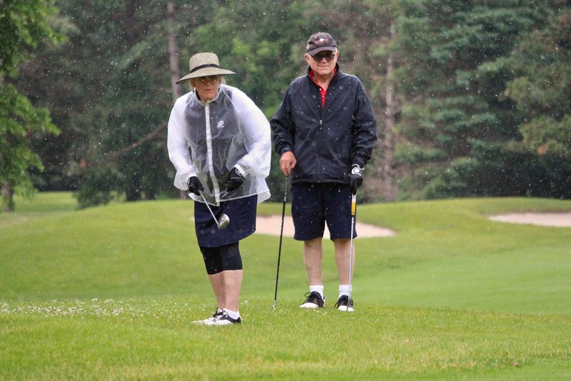 A little rain didn't stop these alums from getting out on the Northfield Golf Course today!