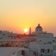 sunset over greek city