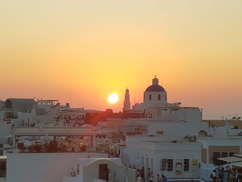 sunset over greek city