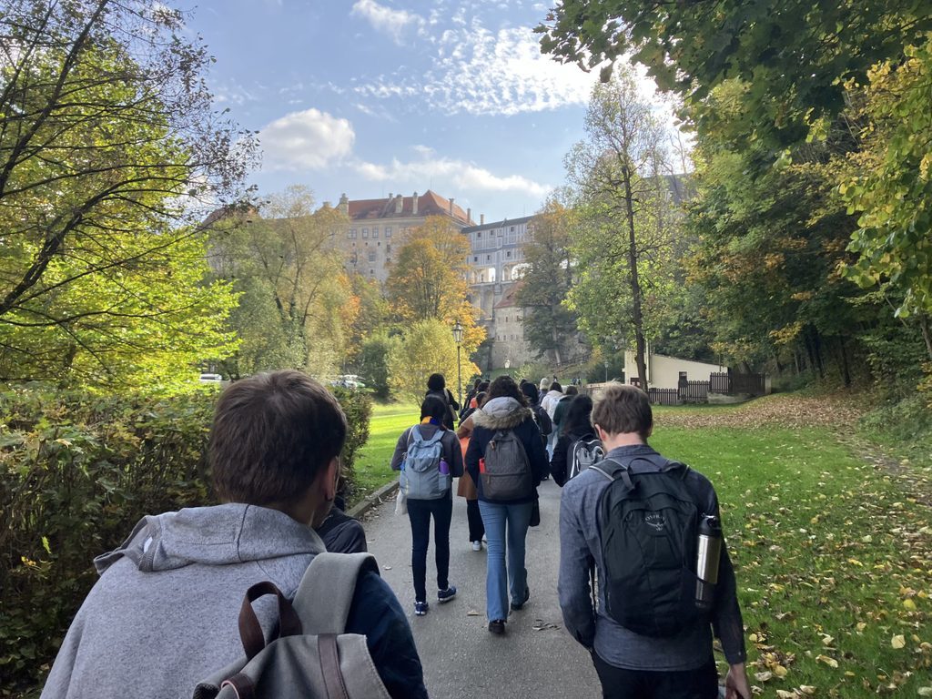 group of students walking toward Cesky Krumlv old town