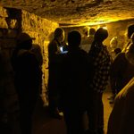 students on a tour in teh catacombs