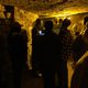 students on a tour in teh catacombs