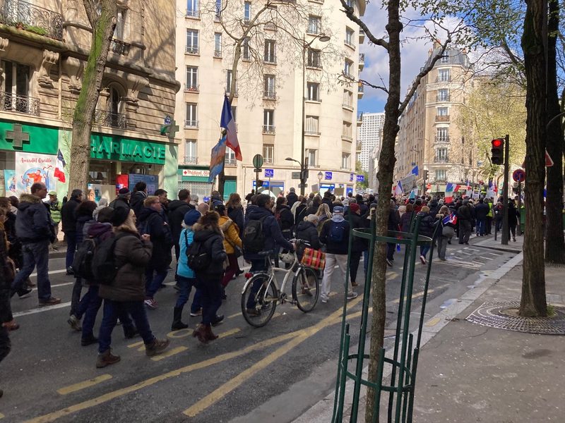 a street full of people walking in france