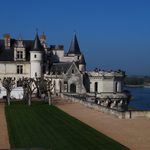 a castle with a manicured lawn