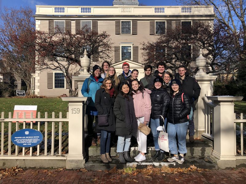 group of students infront of long fellow house