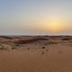sunset over desert on africa and arabia program