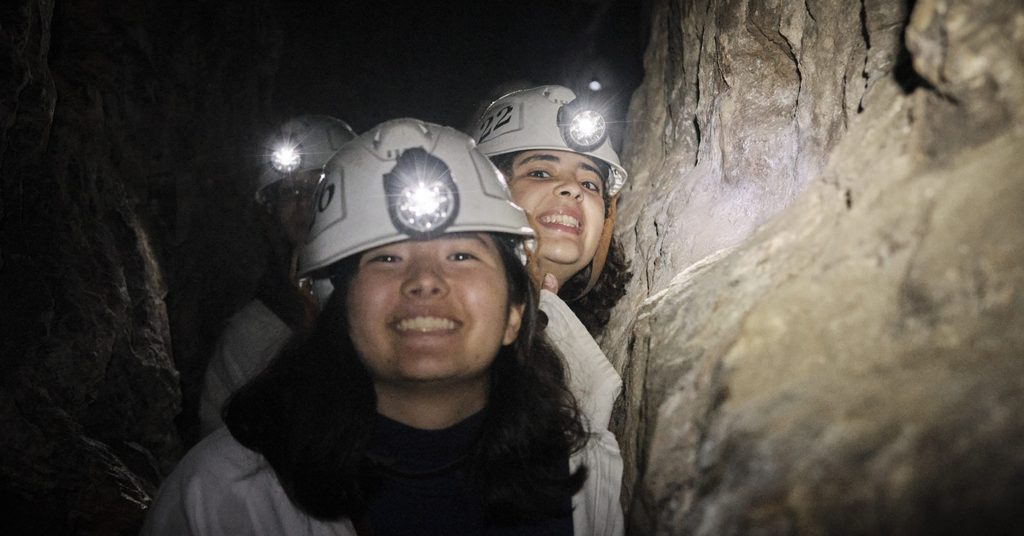 Students smiling in kutna hora mine