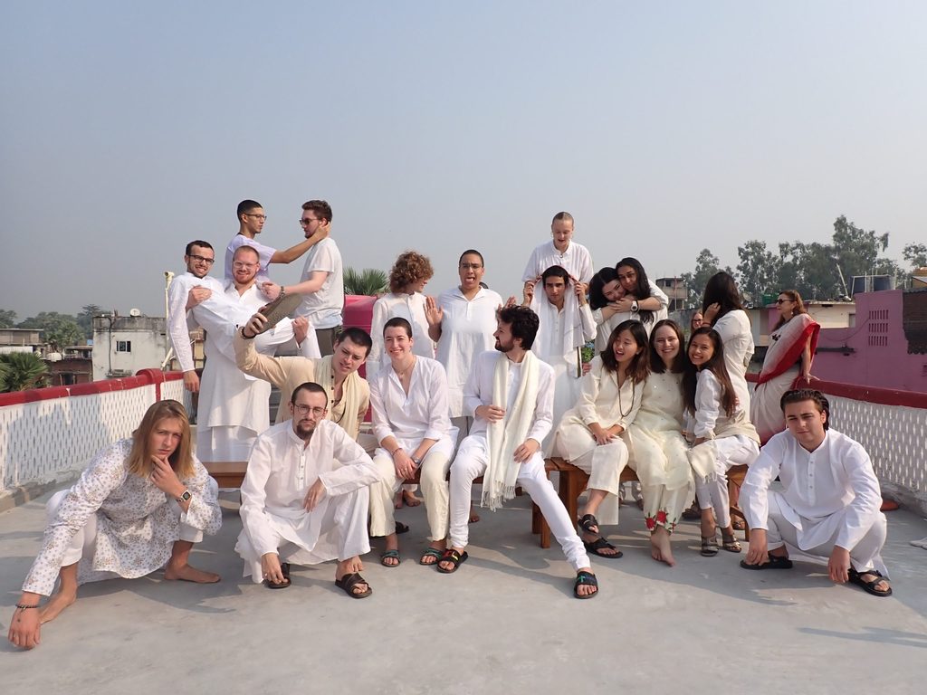 group picture of students wearing all white