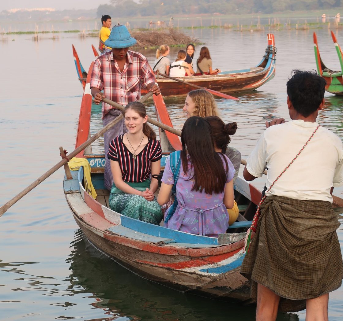 close-up of students in boat