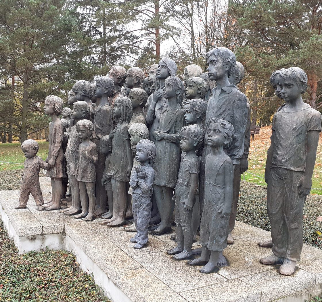 stone statues of children