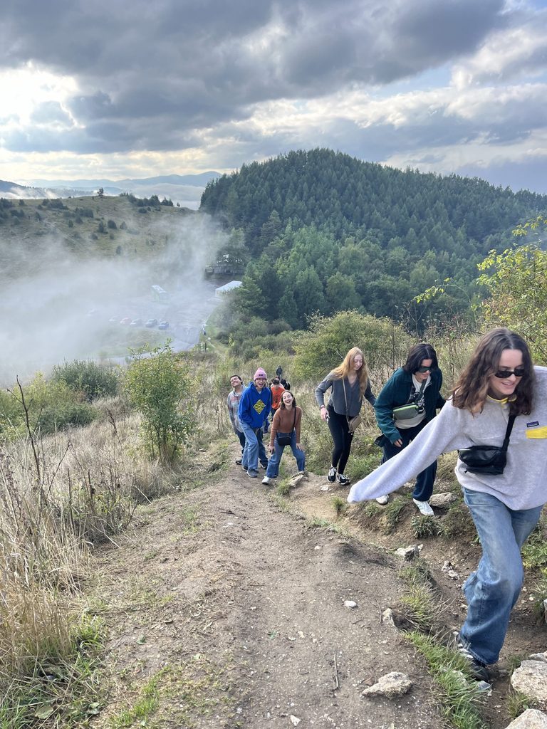 walking up a hill to a castle