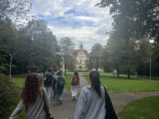 Dylann, Xóchi, and the rest of our class walking to Bohnice Psychiatric Hospital