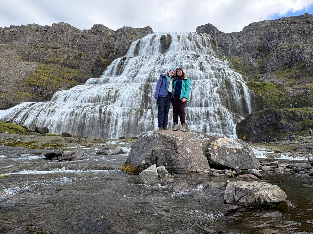 Students in front of waterfall in iceland