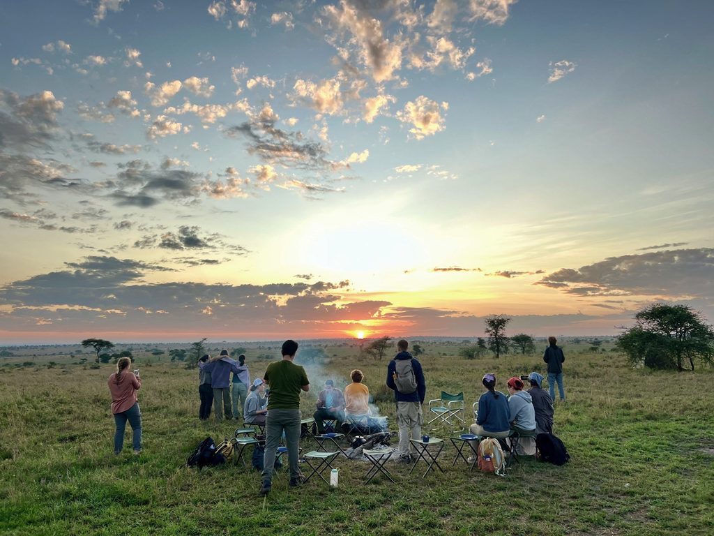 Sunset picnic on a hill