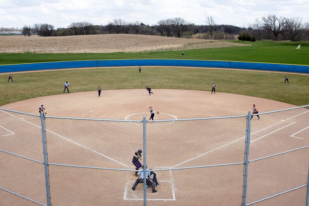 bird's eye view of a softball field where a game is happening