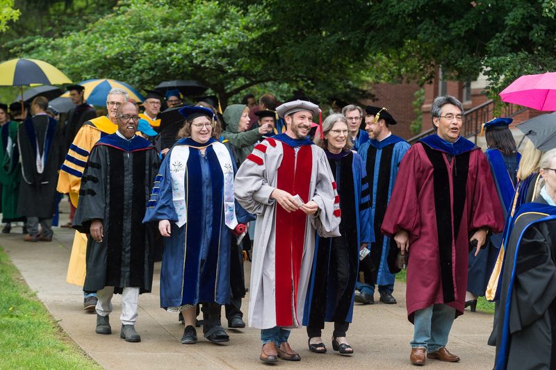 Faculty leading the graduates into Commencement 2022