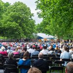 Graduates and loved ones seated at Commencement 2022
