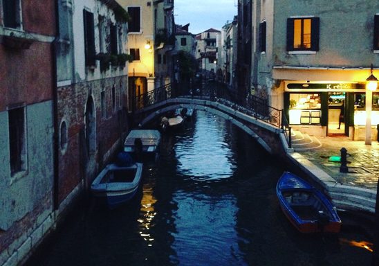 boats on a canal in Venice, Italy