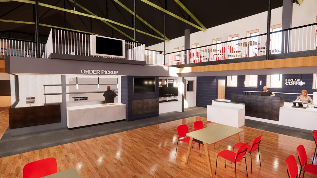 Interior view of Sayles Cafe, which includes an ordering kiosk, food preparation area, wood floors, and tables with red chairs. 