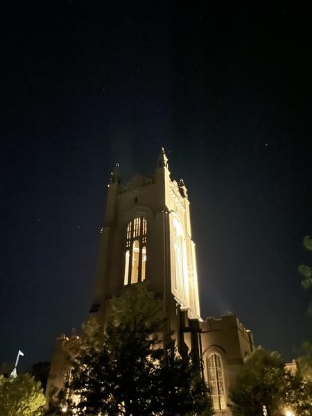 An old chapel building at night.