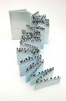 folded book with penguins