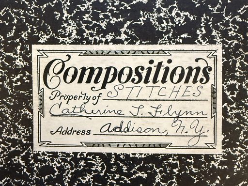 a photograph of the cover of a school composition book that says 