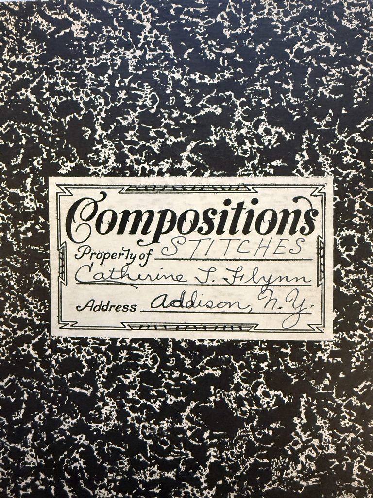 a photograph of the cover of a school composition book that says "STITCHES" property of Catherine Flynn, Addison, N.Y.