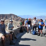 Students gathered along viewing area for desert and rock formations