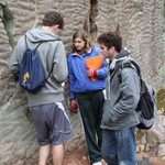 Noah, Rose, and David examine ripple casts in the Baraboo quartzite.