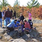 Students examining Eagle Peak, Interstate Park, WI