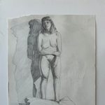 A graphite drawing of a standing nude woman standing nude woman facing the viewer, but looking away