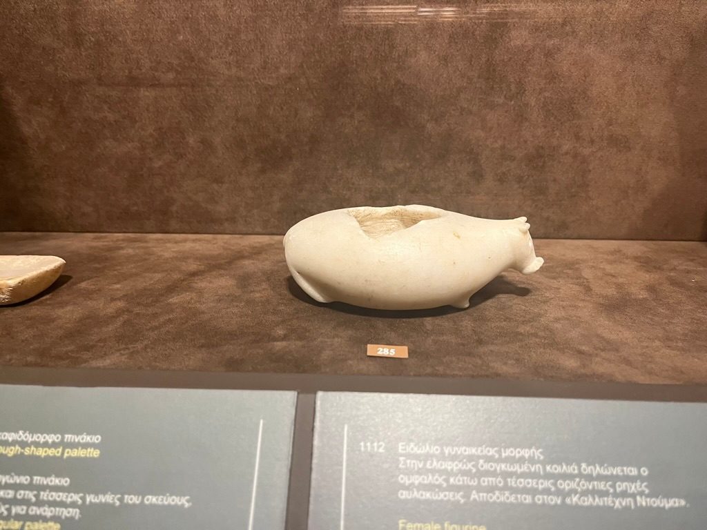 A round pig bowl of unknown function.