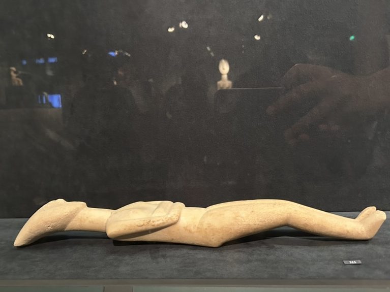 Female Cycladic figure in reclined position