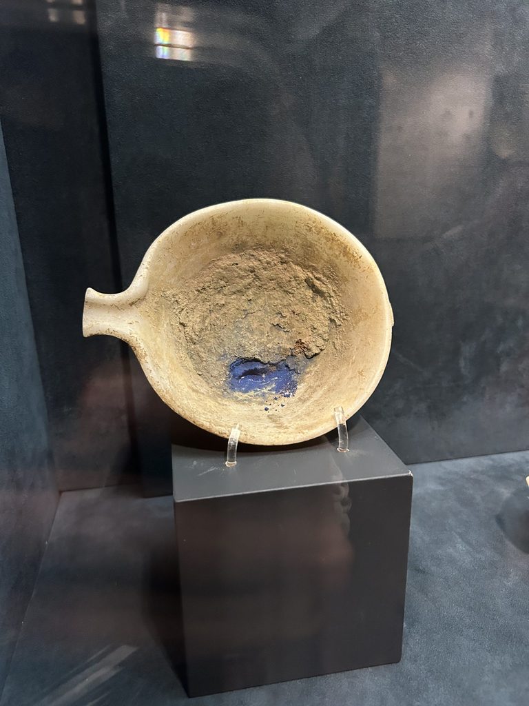 clay bowl with blue powder dye
