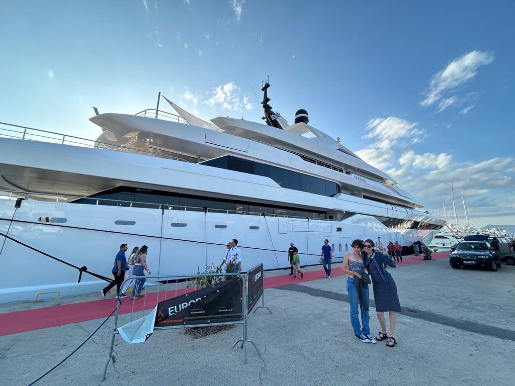 My aunt and I stand next to O'Pari, a huge yacht, at the Mediterranean Yacht Show