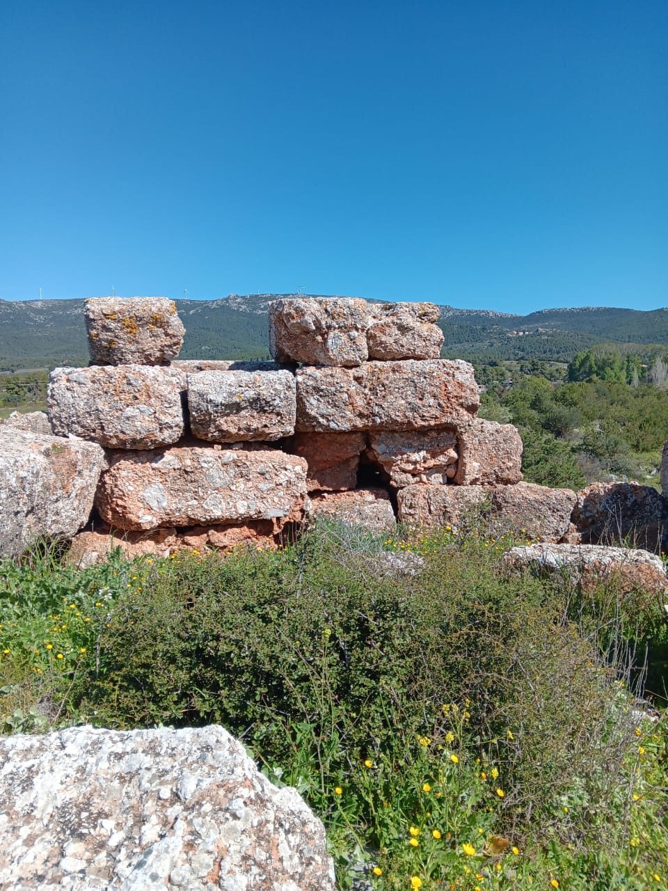 A pile of stones that used to make part of the fortification wall.