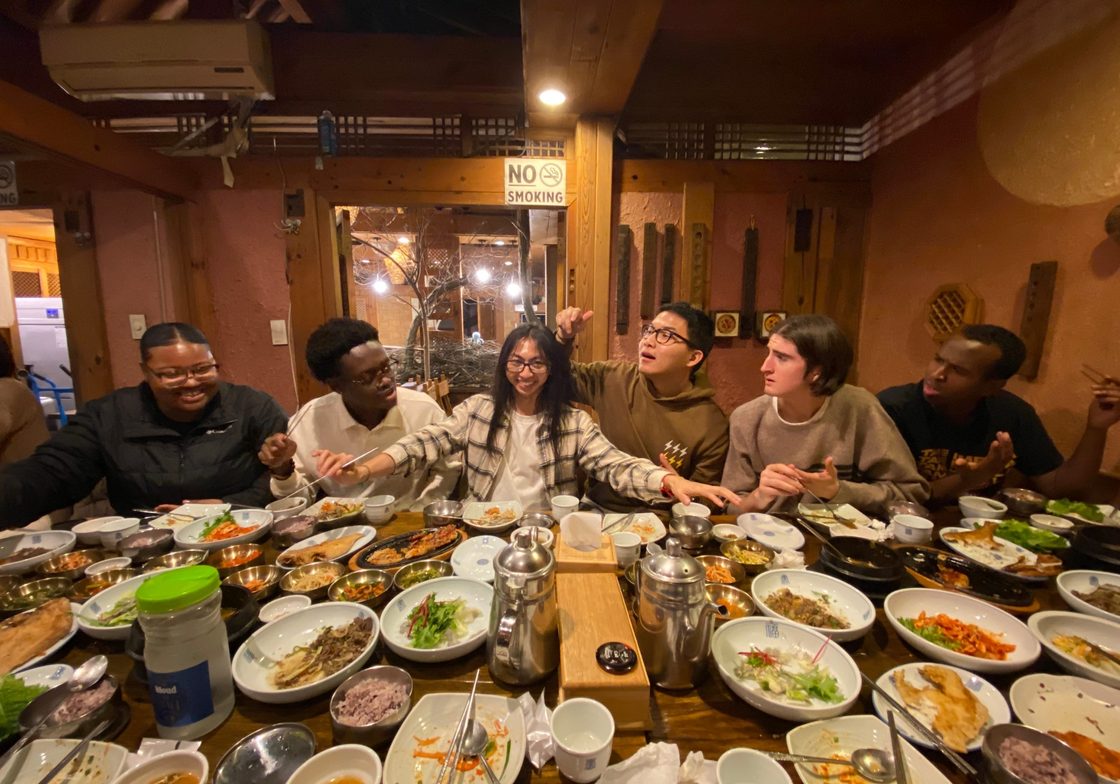 Students enjoying a Korean dinner
