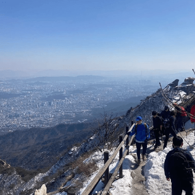 Students at the top of Bukhansan, the tallest of the mountains around Seoul