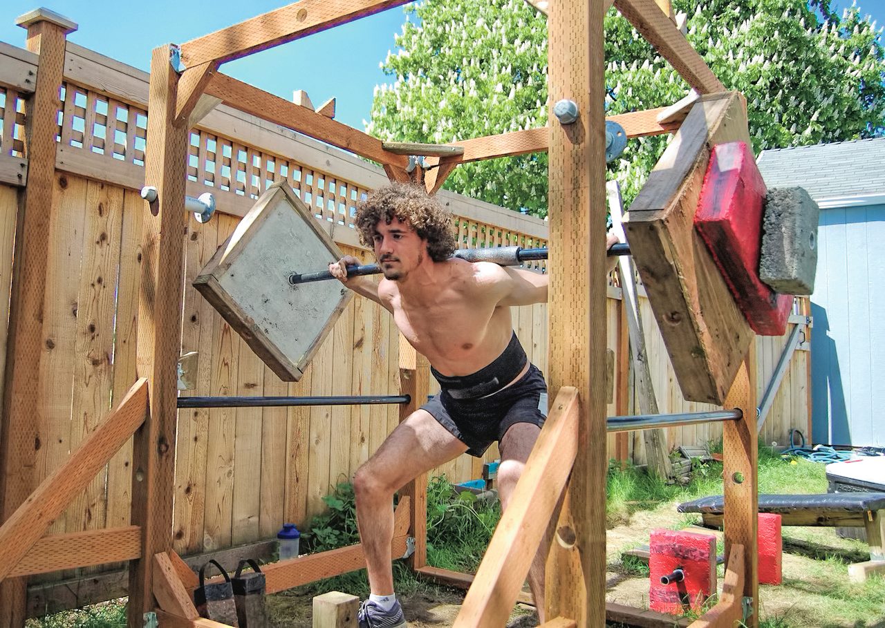 Oscar Christoph ’22 works out in his yard.