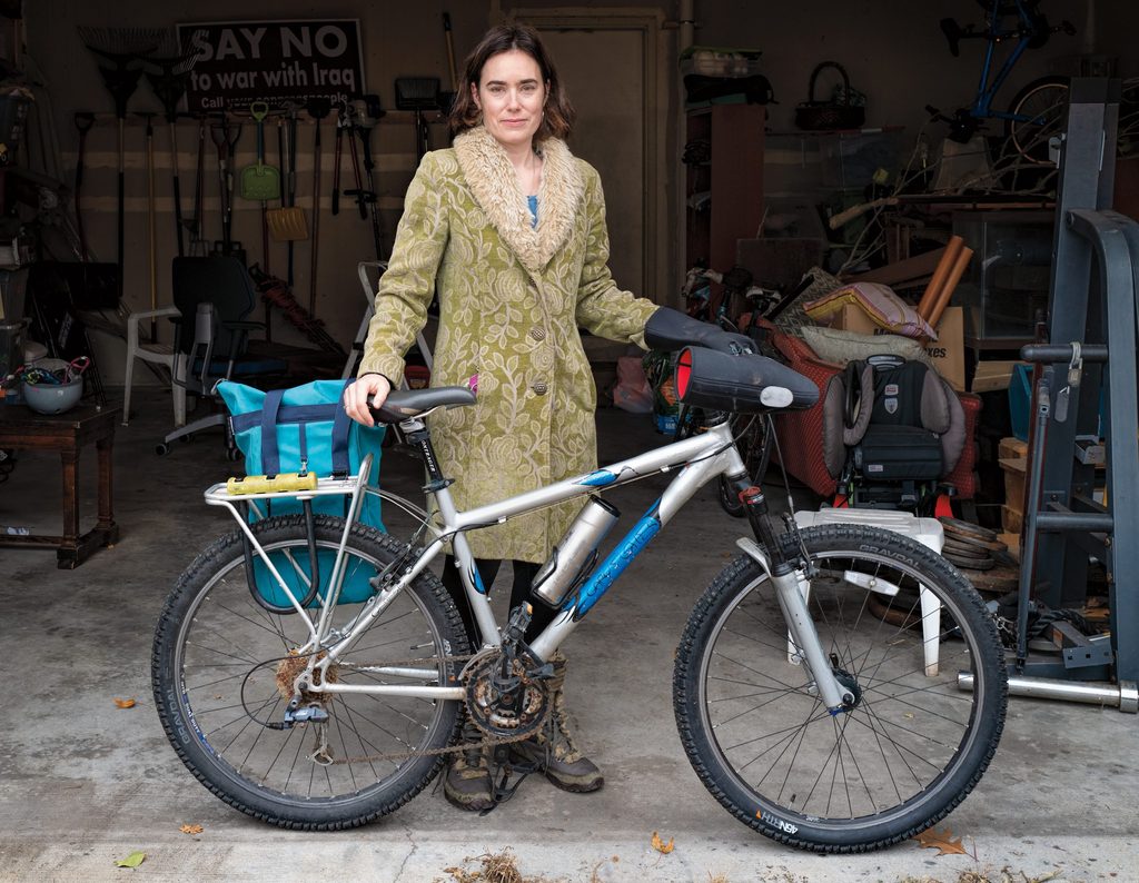 Catherine Justice ’98 with a bicycle