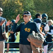 Dick Donaldson ’48, P ’73, ’76 is honored for his military service and athletic accomplishments.