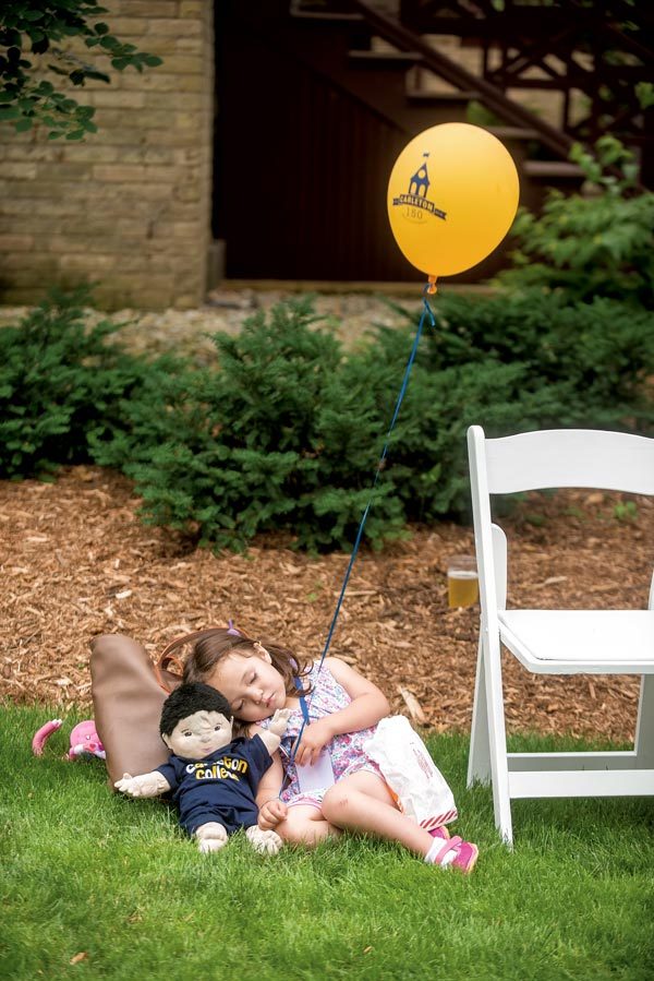 A child naps at Reunion 2016