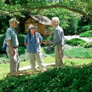 Professor Bardwell Smith, gardener Mary Bigelow, and designer David Slawson
