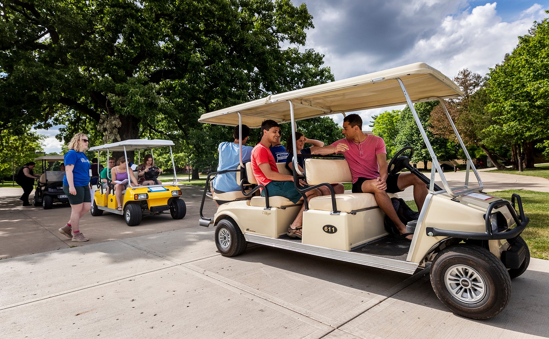 Reunion workers in golf carts