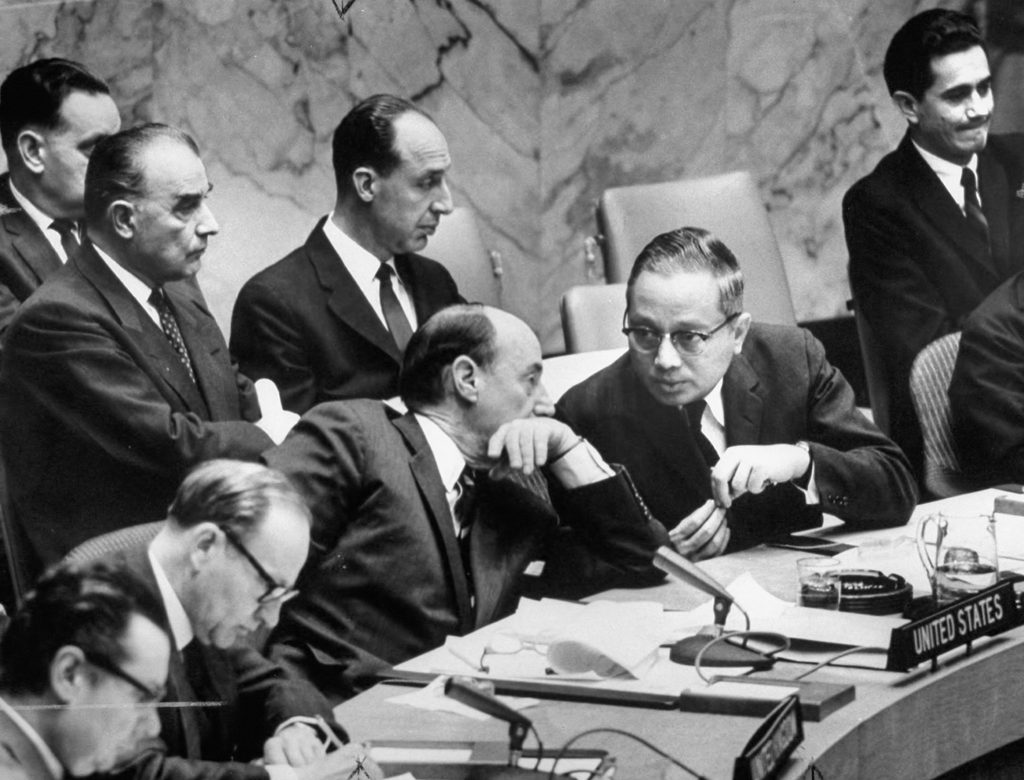 US Ambassador to the UN Adlai E. Stevenson conferring with Secy. Gen. U Thant during special session of Security Council to discuss the Panama Canal