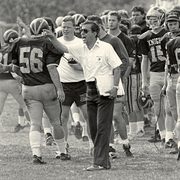 Coah Bob Sullivan with his football team