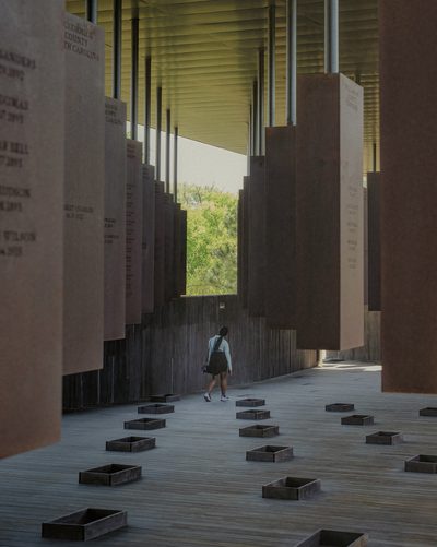A student visits the lynching memorial at the National Memorial for Peace and Justice in Montgomery